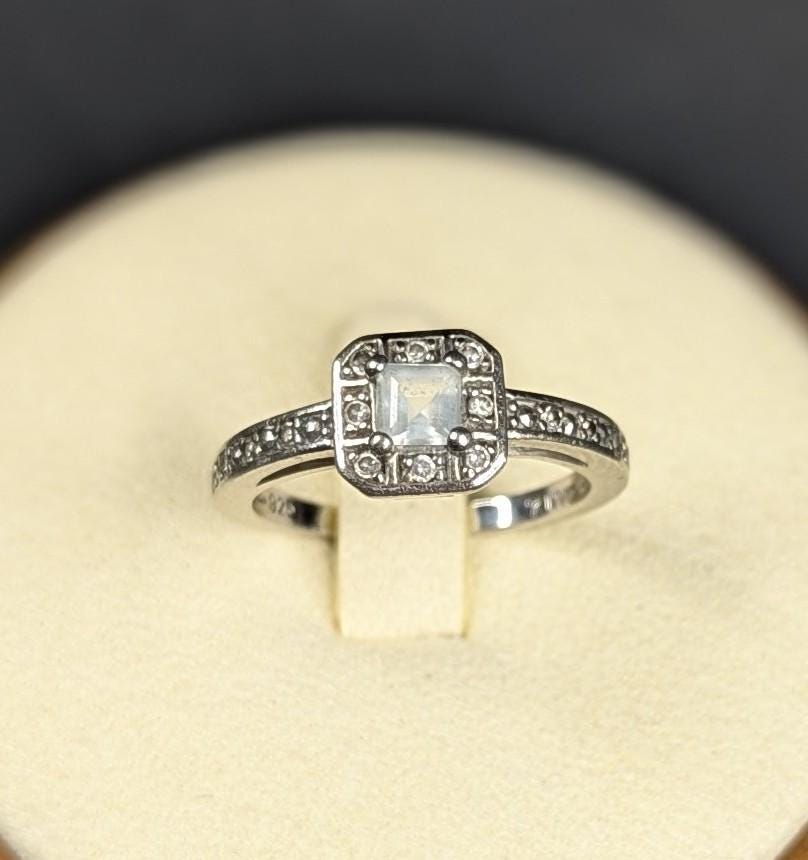 Sterling Silver Light Blue Topaz Solitaire With Clear Stone Accents, Ring Size 6.75